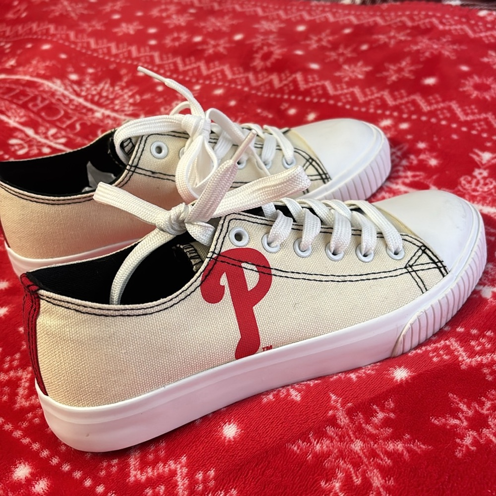 Selling size 9 in women’s Philadelphia Phillies sneakers! Color is cream